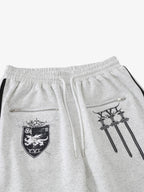 Crest & Sword Graphic Side Stripe Sweatpants
