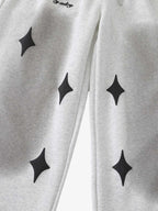 Spray Paint Star Print Distressed Sweatpants