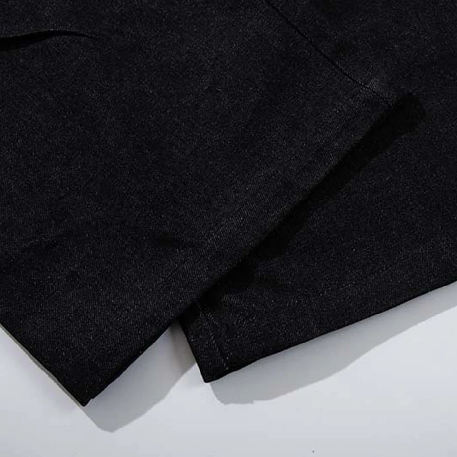 Rivet Black Patchwork Denim Baggy Jeans — fabric close-up