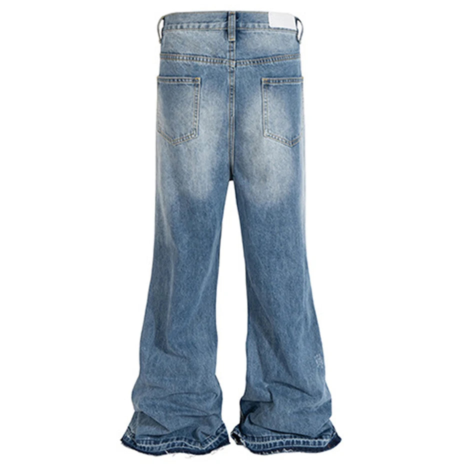Blue Ripped Denim Flare Jeans — front view