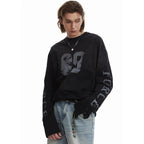 Vintage Black Letter Graphic Oversized Long Sleeve Tee — detail shot