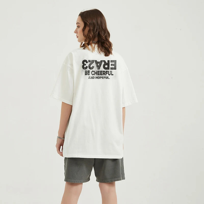 Vintage Beige Graffiti Graphic T-Shirt — fabric close-up