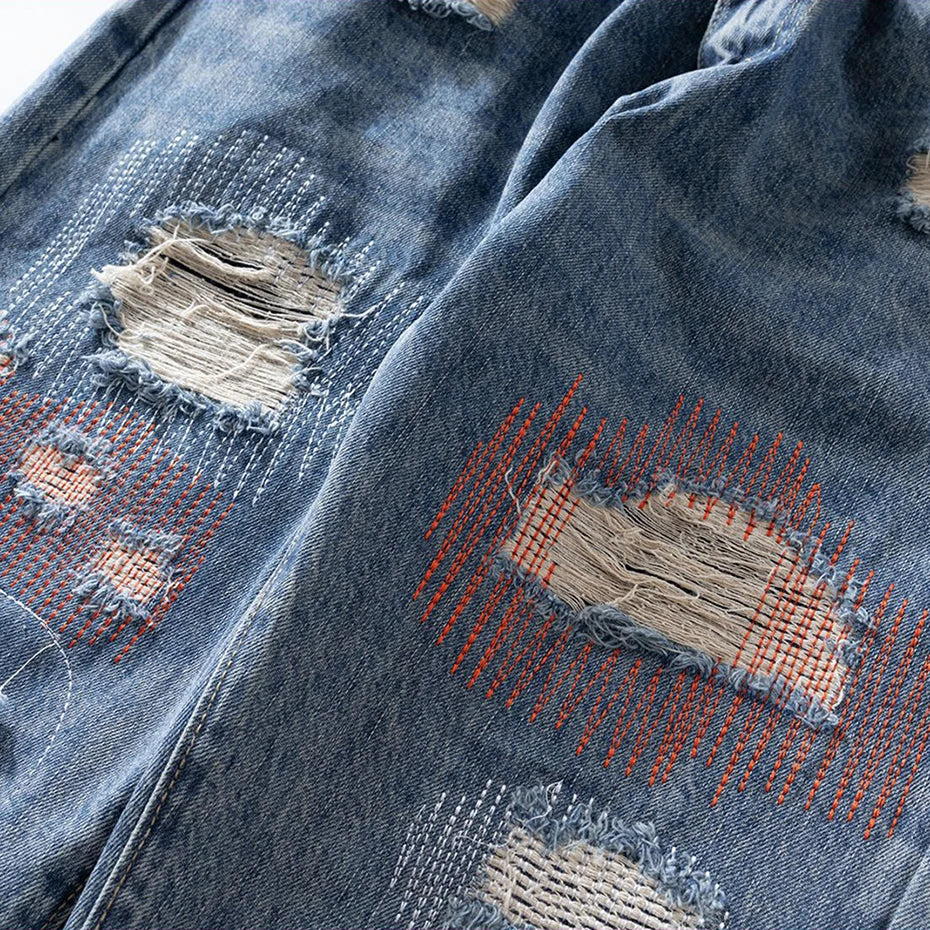 Red Denim Flare Ripped Jeans — detail shot