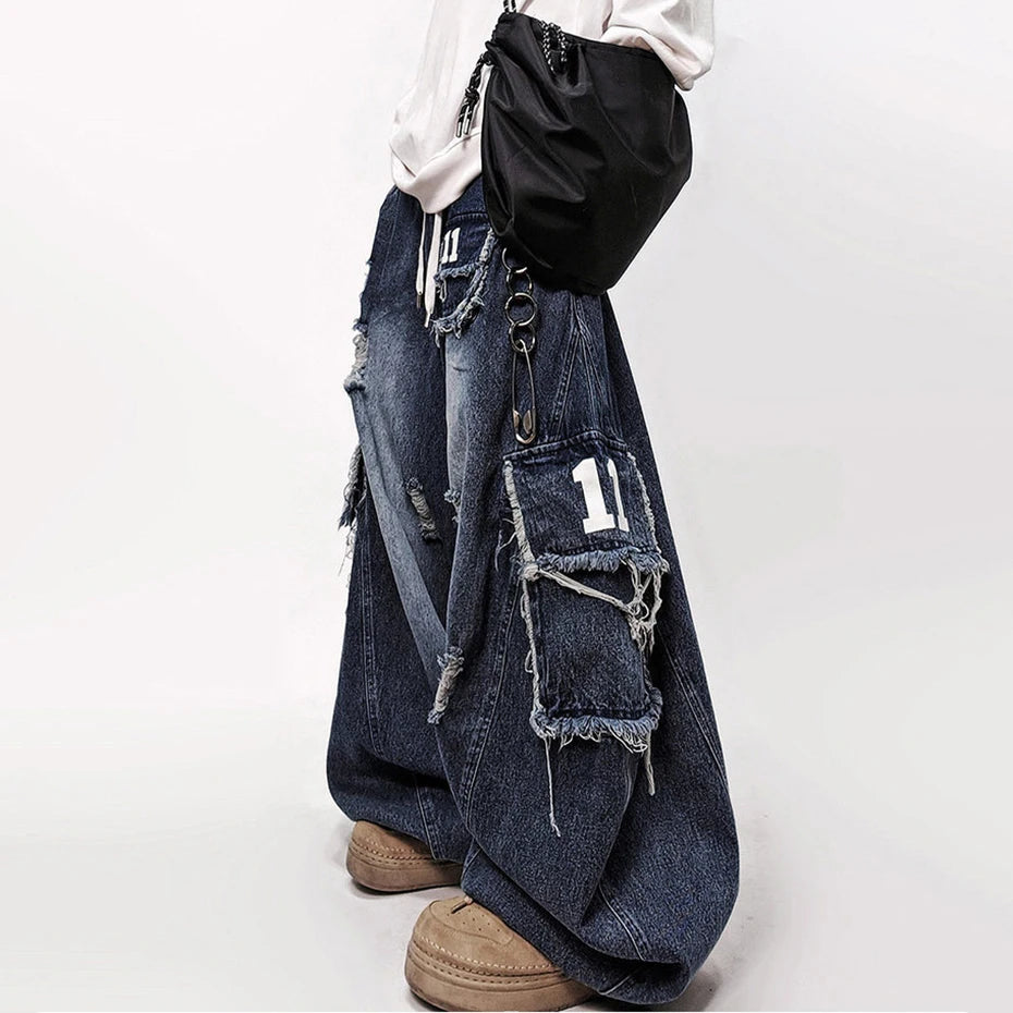 Vintage Blue Denim Baggy Ripped Jeans — back view