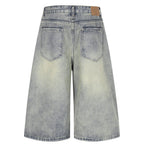 Vintage Blue Ripped Mid Rise Denim Shorts — back view