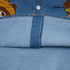 Vintage Cartoon Cat Graphic Denim Loose Shirt — fabric close-up