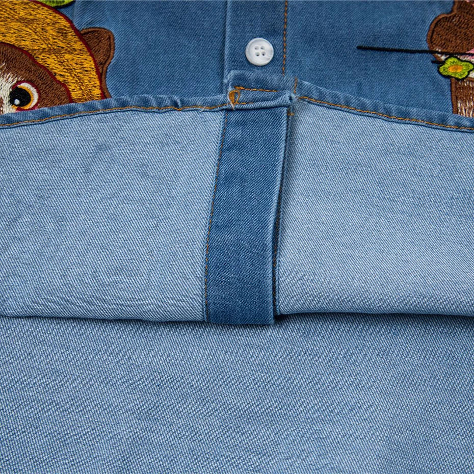 Vintage Cartoon Cat Graphic Denim Loose Shirt — fabric close-up