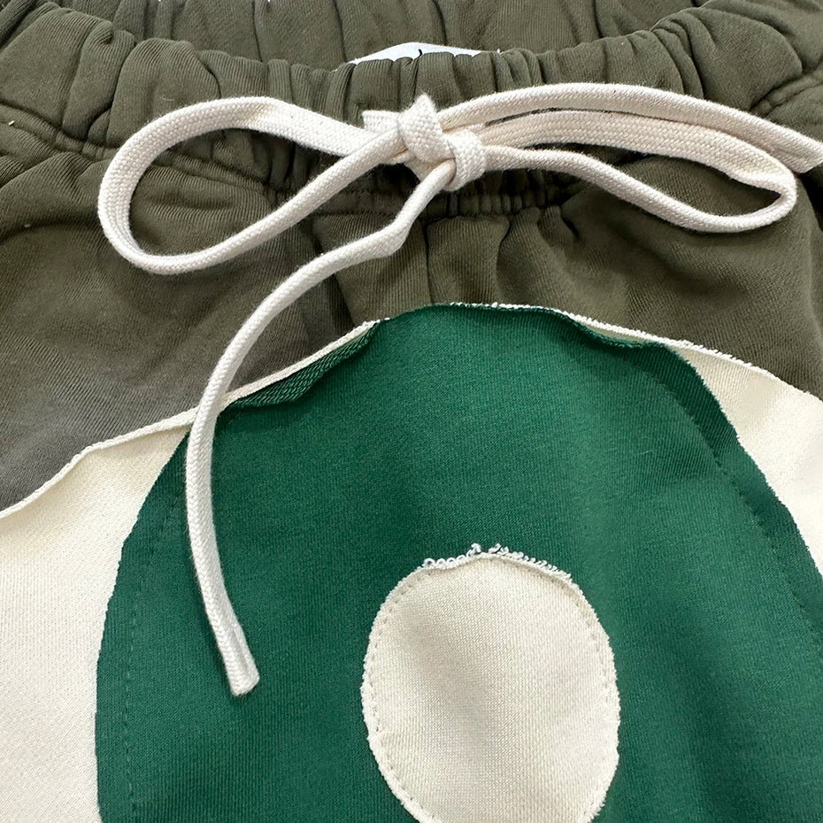 Vintage Eyes Patchwork Sweat Shorts — fit shot