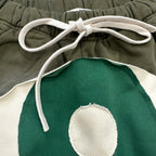 Vintage Eyes Patchwork Sweat Shorts — fit shot