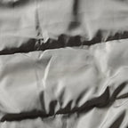 Duck White Padded Oversized Puffer Jacket — fabric close-up