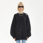 Y2K Black Ripped Knit Sweater — detail shot