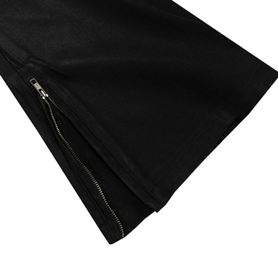 Black Print Denim Flare Jeans — fabric close-up