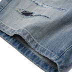 Vintage Blue Ripped Loose Denim Shorts — fabric close-up