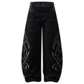 Black Embroidered Denim Baggy Jeans — styling shot