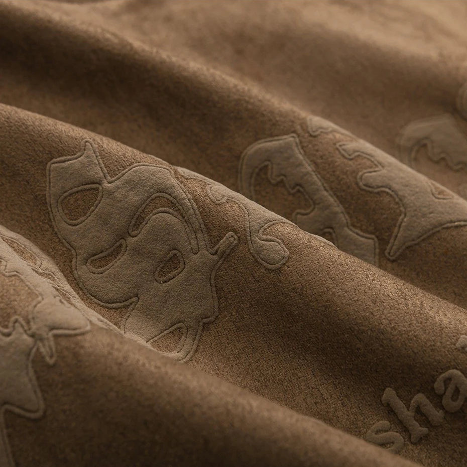 Skeleton Wings Graphic Suede Loose T-Shirt — fabric close-up