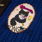 Cartoon Cat Graphic Oversized Shirt — fabric close-up