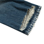 Vintage Ripped Denim Baggy Jeans — fabric close-up