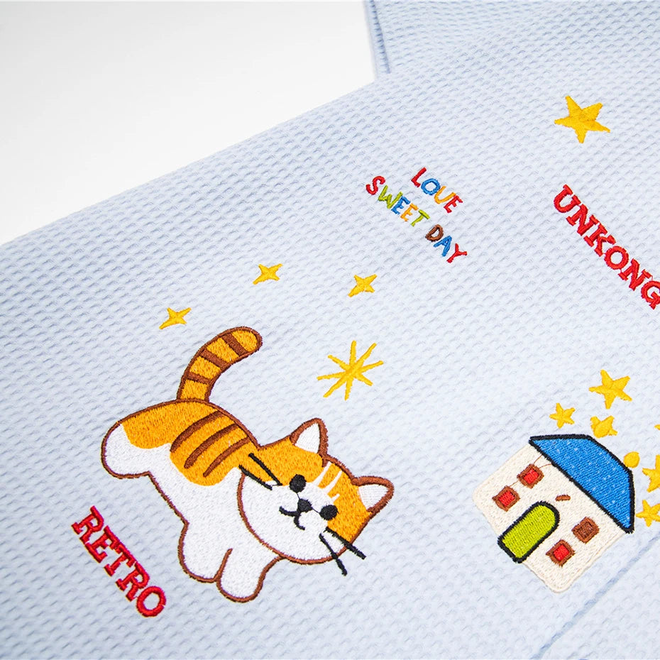 Cartoon Cat Graphic Loose Shirt — fit shot
