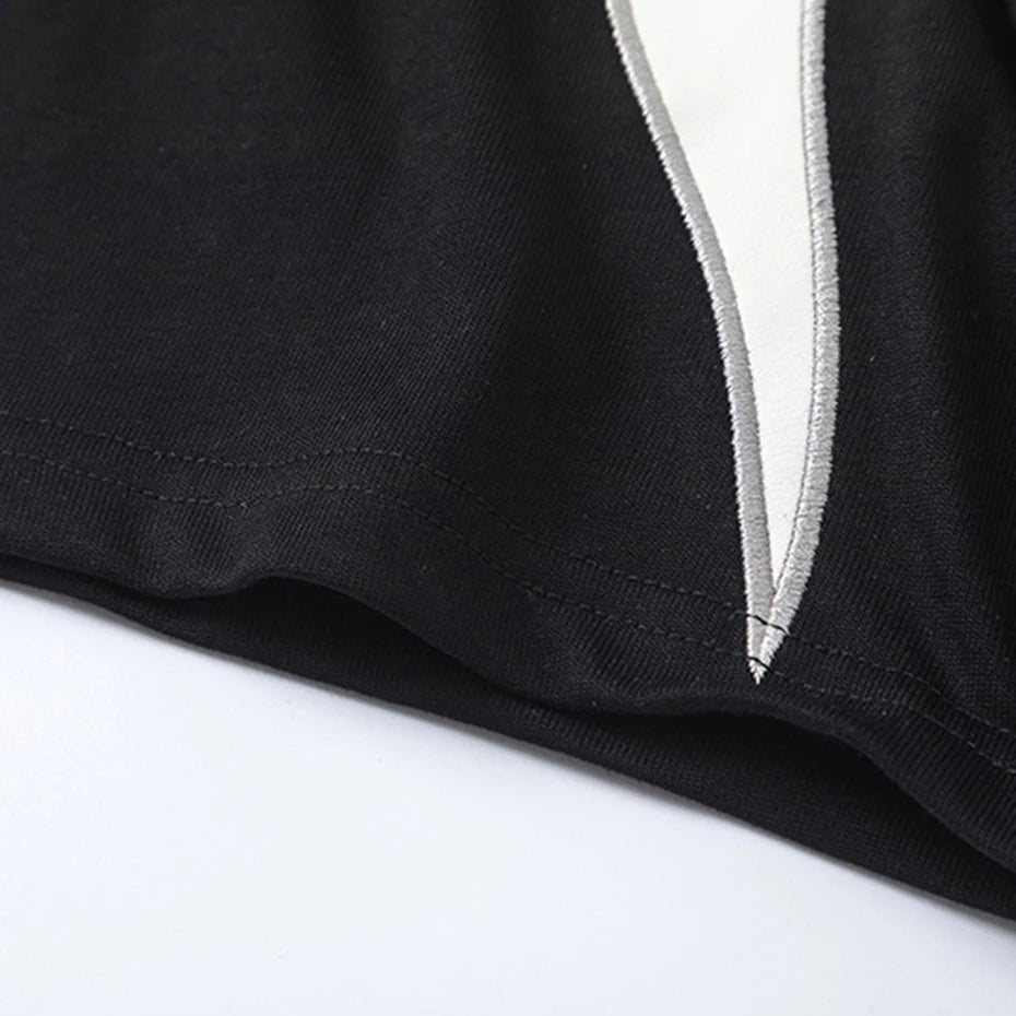 Black Spliced Graphic Oversized T-Shirt — fabric close-up