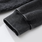 Black Cartoon Anime Graphic Oversized Hoodie — fabric close-up
