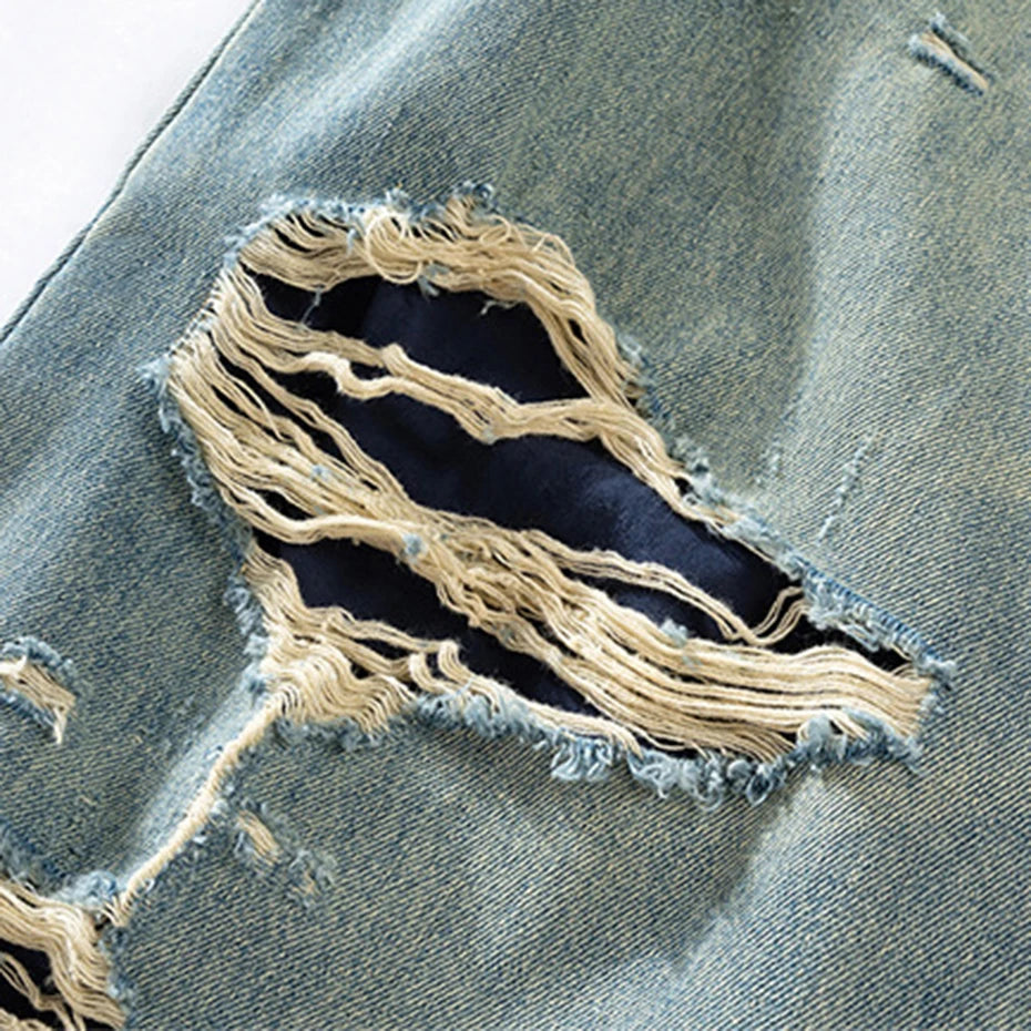 Blue Denim Baggy Ripped Jeans — fabric close-up