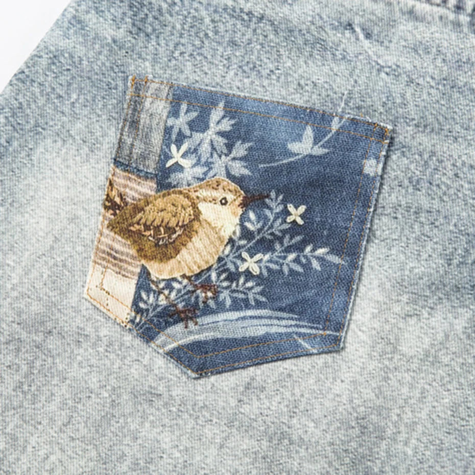 Vintage Blue Star Patchwork Loose Denim Shorts — fabric close-up