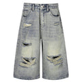 Vintage Blue Ripped Mid Rise Denim Shorts — styling shot