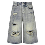 Vintage Blue Ripped Mid Rise Denim Shorts — styling shot