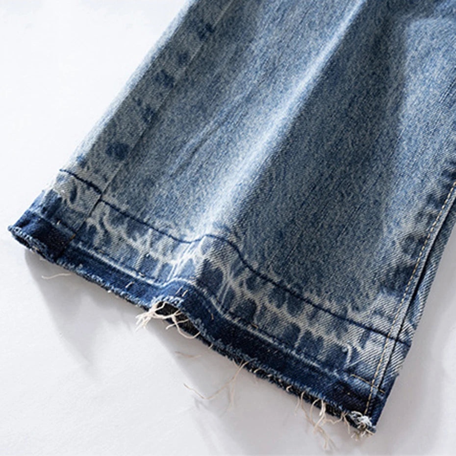 Red Denim Flare Ripped Jeans — fabric close-up
