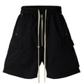 Black Loose Cargo Shorts — styling shot