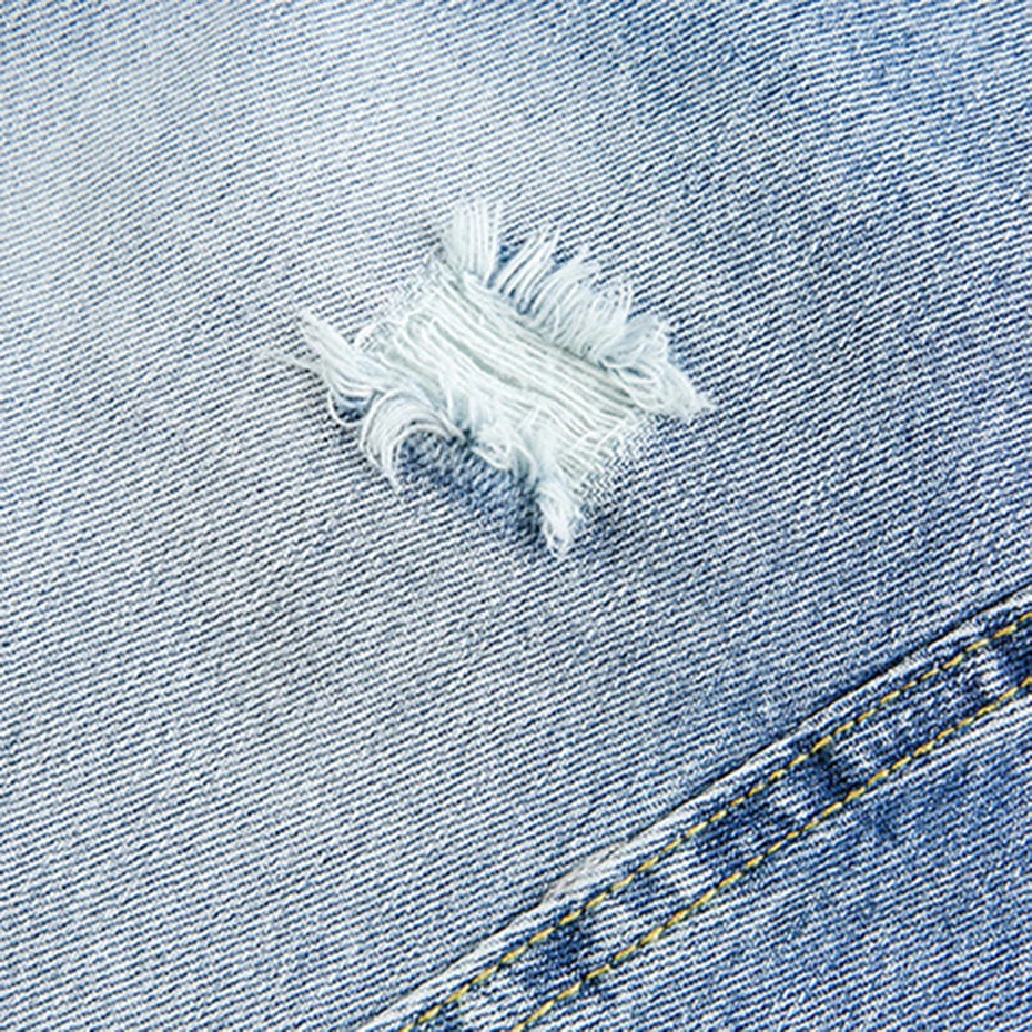 Y2K Blue Ripped Loose Denim Shorts — fabric close-up