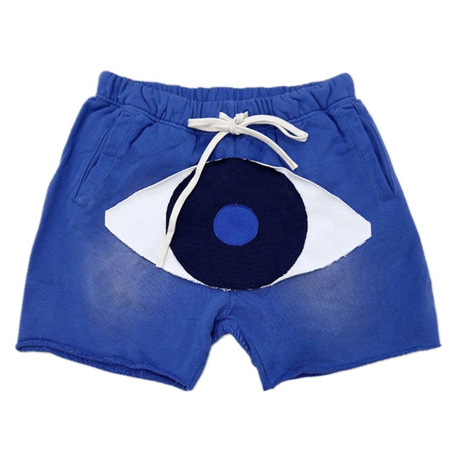 Vintage Eyes Patchwork Sweat Shorts — styling shot