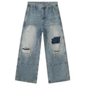 Patchwork Vintage Blue Ripped Denim Baggy Jeans — fabric close-up