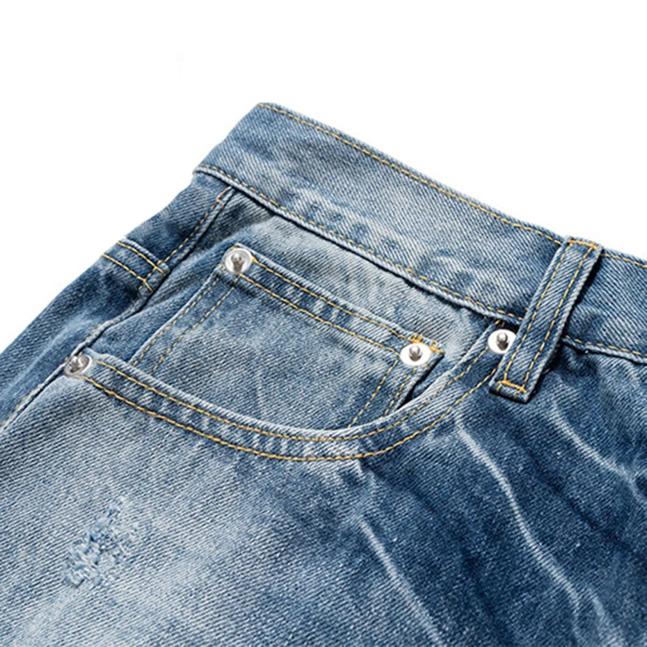 Blue Ripped Denim Flare Jeans — back view