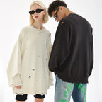 Y2K Black Ripped Knit Sweater — fabric close-up