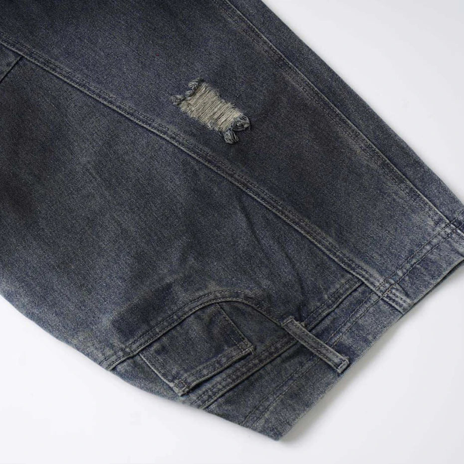 Vintage Blue Ripped Denim Wide Leg Jeans — fabric close-up
