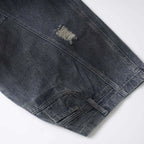 Vintage Blue Ripped Denim Wide Leg Jeans — fabric close-up