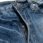 Blue Ripped Denim Flare Jeans — detail shot