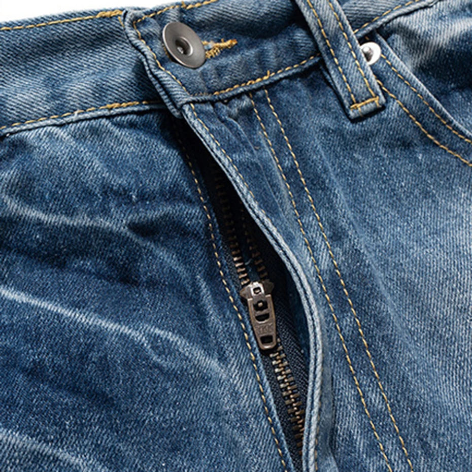 Blue Ripped Denim Flare Jeans — detail shot