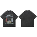 Vintage Black Angel Devil Faded T-Shirt — fabric close-up