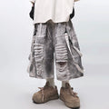 Vintage Ripped Baggy Denim Shorts — fabric close-up