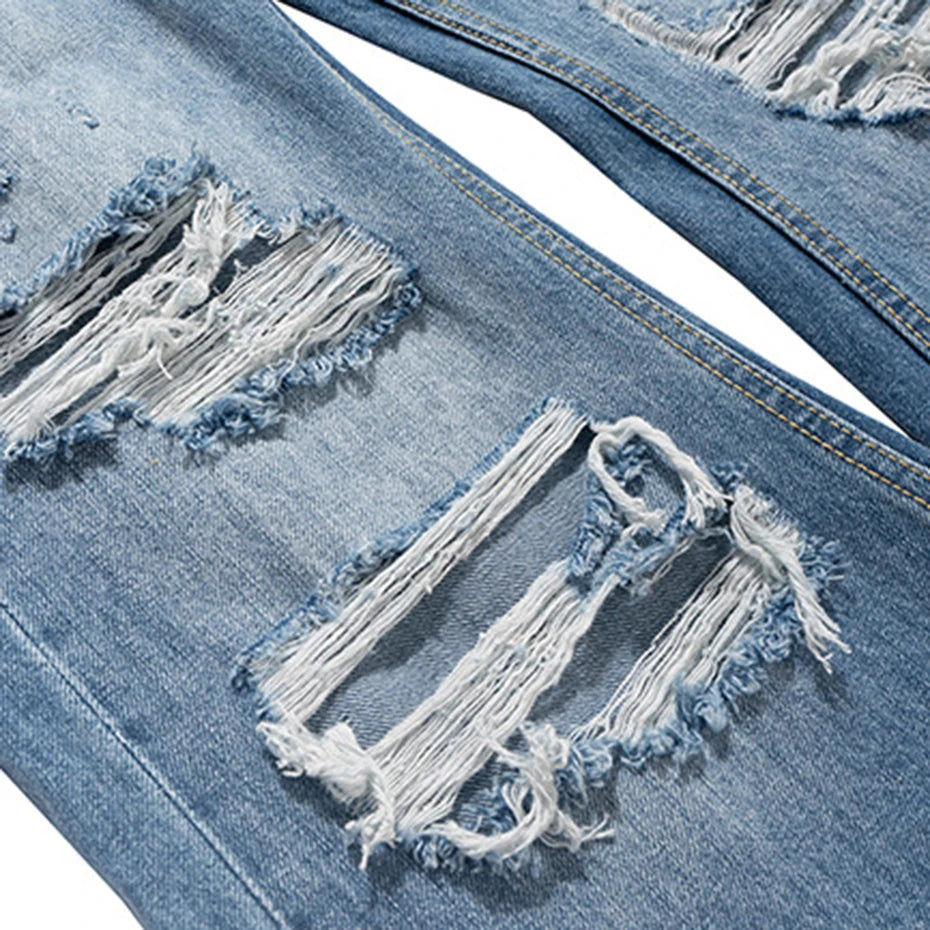 Blue Ripped Denim Flare Jeans — fit shot