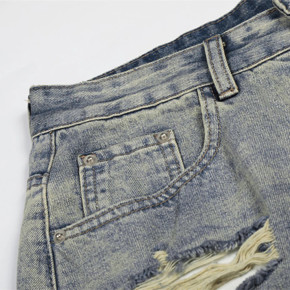 Vintage Blue Ripped Mid Rise Denim Shorts — detail shot