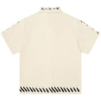 Loose Short Sleeve Button-Up Shirt — front view