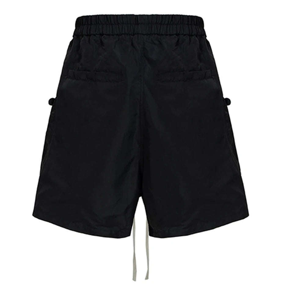 Pockets Black Loose Cargo Shorts — front view