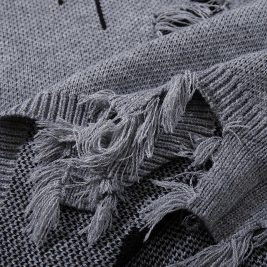 Vintage Ripped Knit Oversized Sweater — fabric close-up