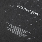Searching Retro Black Washed T-Shirt — detail shot