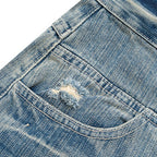 Vintage Blue Ripped Denim Baggy Jeans — detail shot