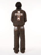 SUPM Graffiti Print Leather Leopard Print Baggy Pants