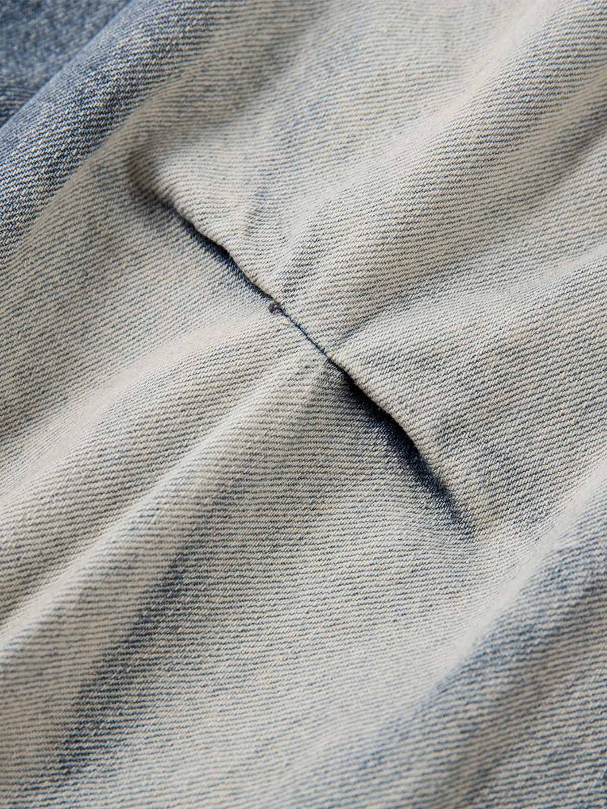 Distressed Washed Pleated Jeans